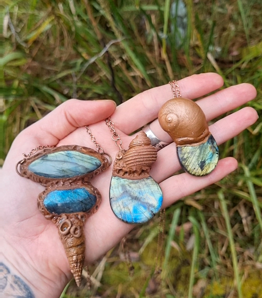 Seashell snail copper electroformed pendant with green and blue labrodorites