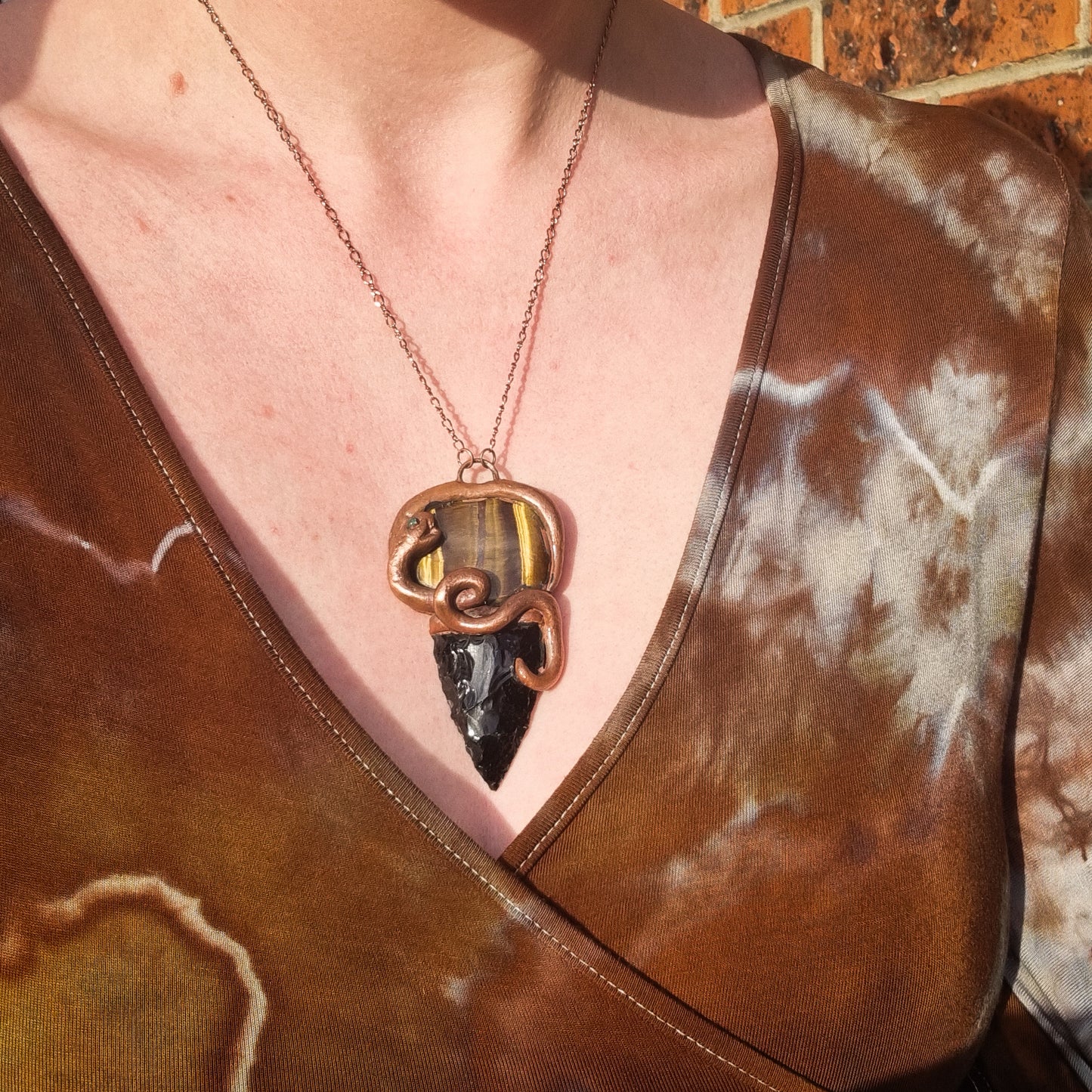 Ancient Python amulet with Emerald, tiger's eye and Obsidian arrowhead