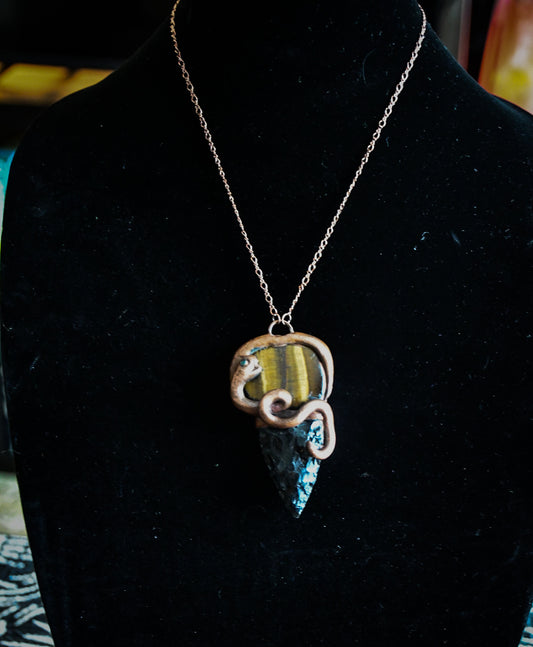 Ancient Python amulet with Emerald, tiger's eye and Obsidian arrowhead