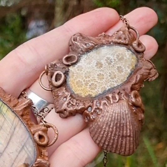 Seashell copper electroformed pendant with fossilised coral