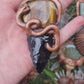 Ancient Python amulet with Emerald, tiger's eye and Obsidian arrowhead
