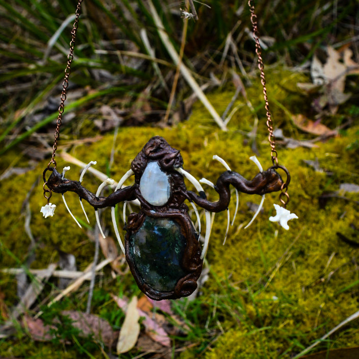 Cloud Forest: Snake skeleton, moss agate, and moonstone copper electroformed necklace