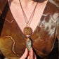 Ancient Sun amulet with tiger's eye and flint stone arrowhead