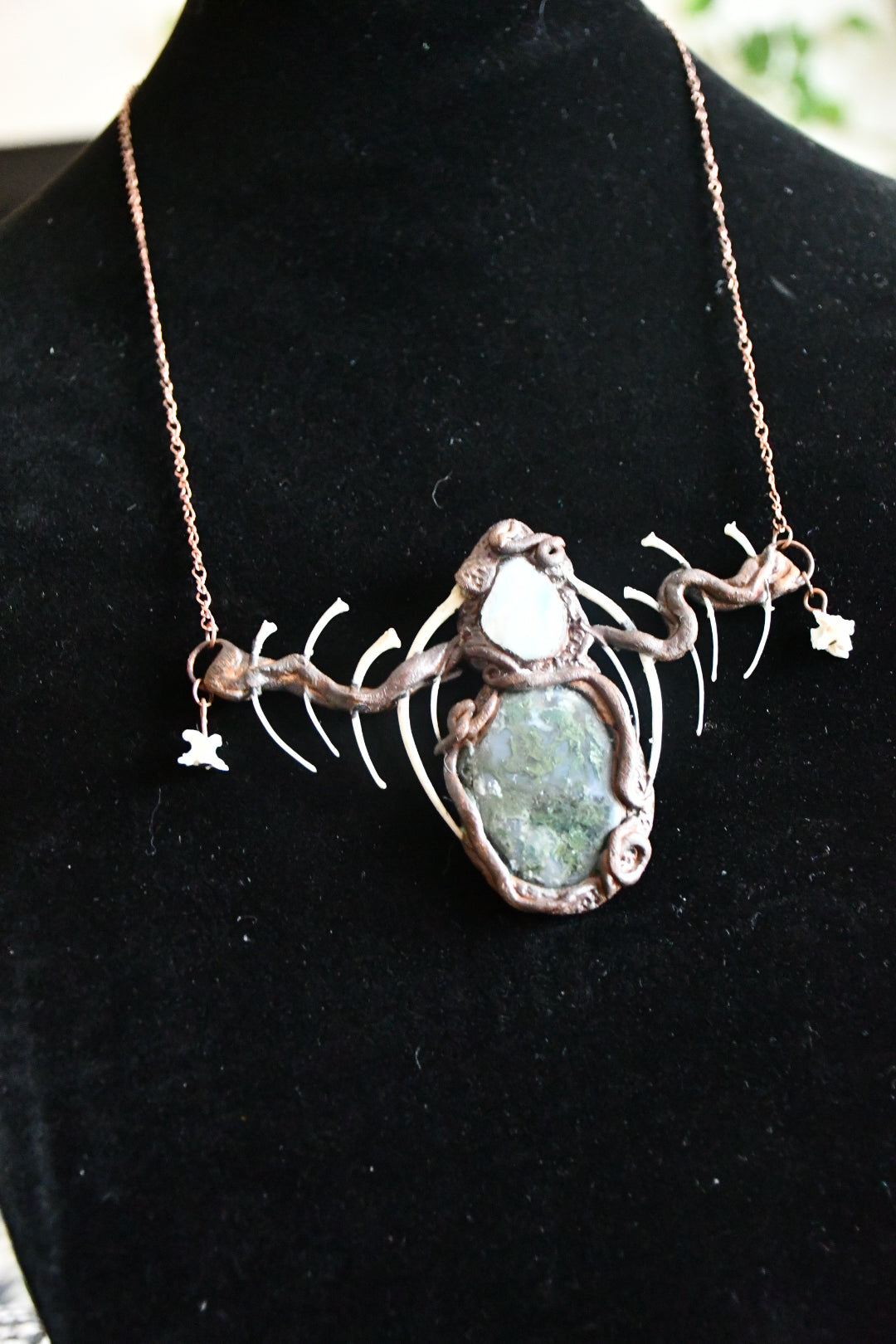 Cloud Forest: Snake skeleton, moss agate, and moonstone copper electroformed necklace