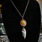 Ancient Sun amulet with tiger's eye and flint stone arrowhead