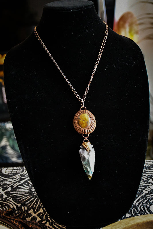 Ancient Sun amulet with tiger's eye and flint stone arrowhead