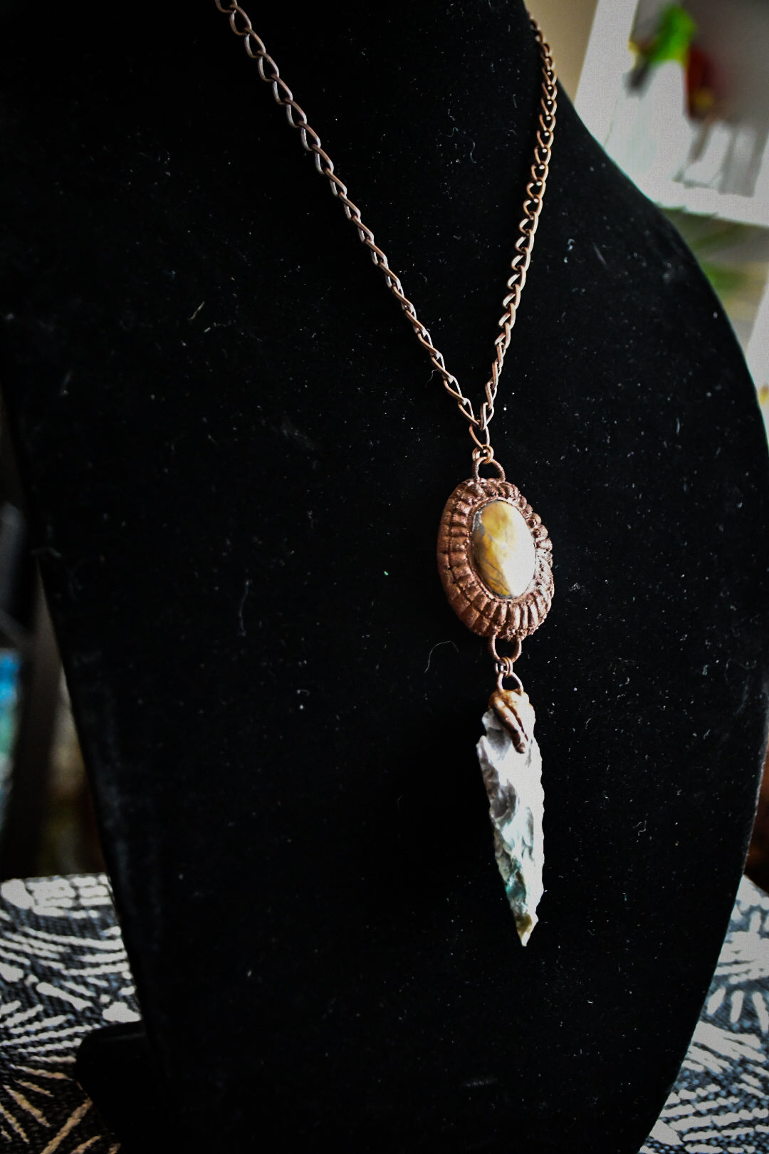 Ancient Sun amulet with tiger's eye and flint stone arrowhead