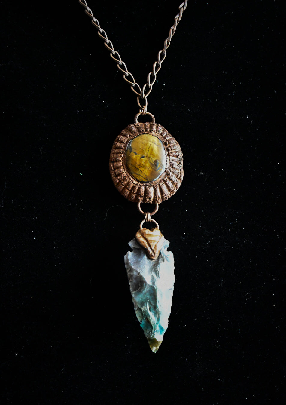 Ancient Sun amulet with tiger's eye and flint stone arrowhead