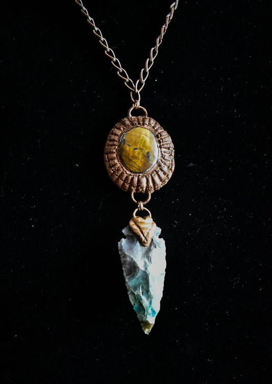 Ancient Sun amulet with tiger's eye and flint stone arrowhead